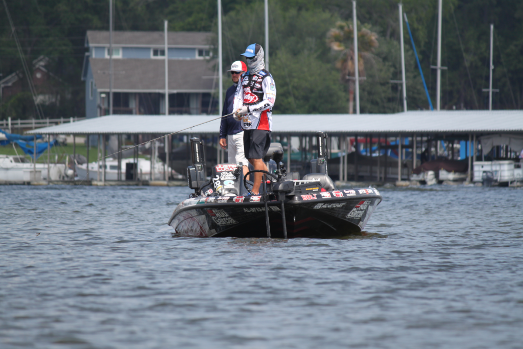 Justin Lucas fishing from a bass boat on Lake Conroe during the 2017 Bassmaster Classic