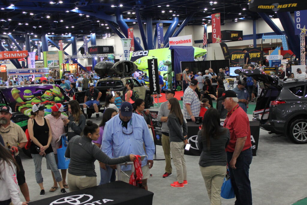 Crowds and exhibitor booths inside the 2017 Bassmaster Classic Outdoors Expo