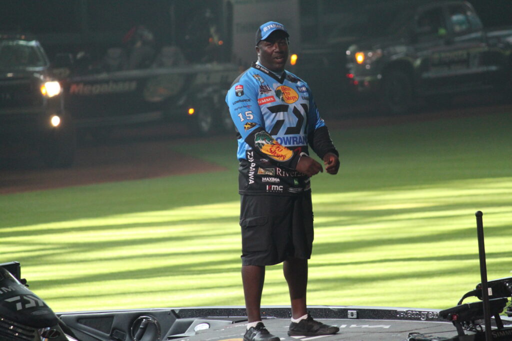 Ish Monroe walking across the 2017 Bassmaster Classic stage
