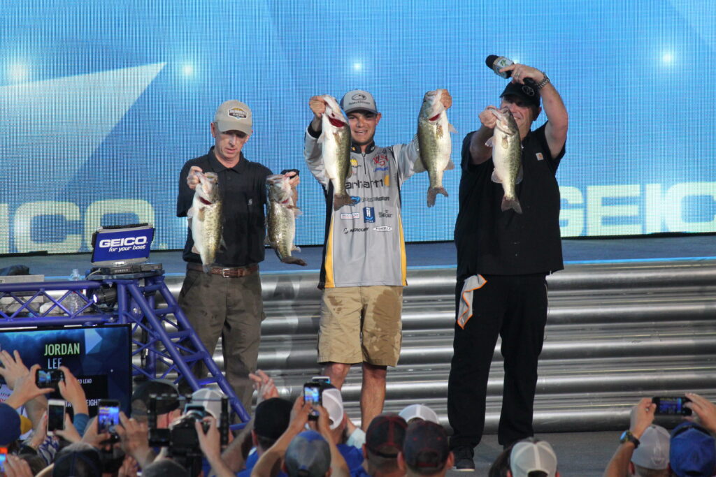 Jordan Lee presenting a five-fish stringer at the 2017 Bassmaster Classic