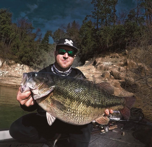 Nick Dulleck with his 11-pound 4-ounce New Bullards Bar bass